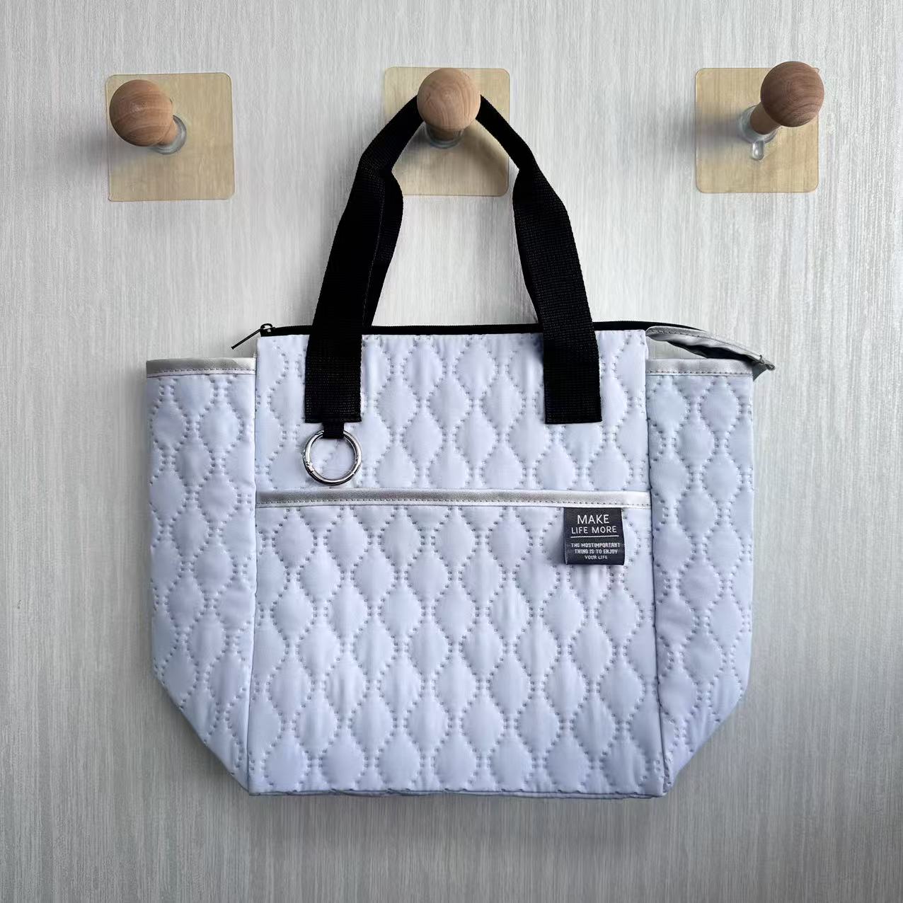 Ultrasonic pleated fabric handbag with silver coating