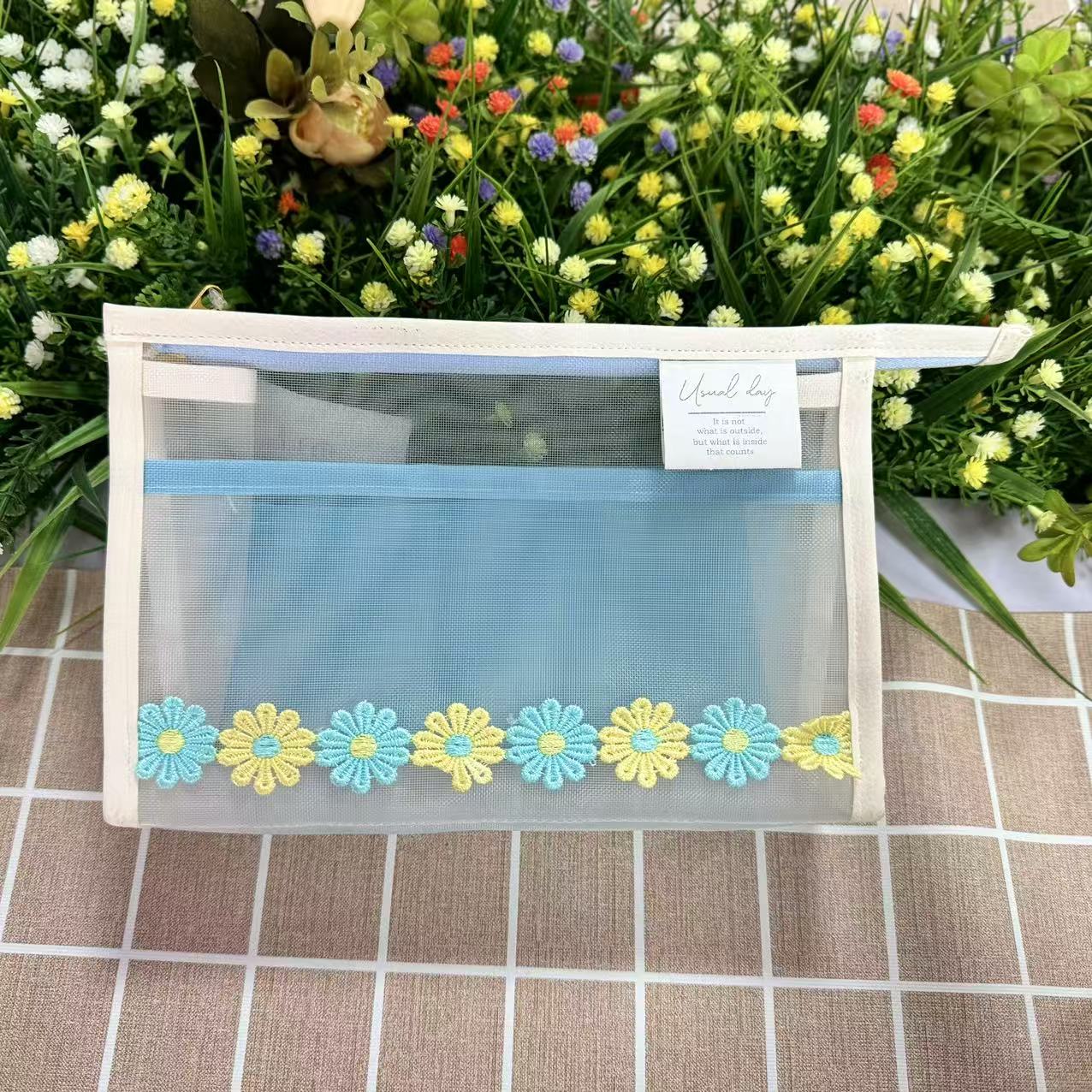 Mesh cosmetic pouch with flower lace